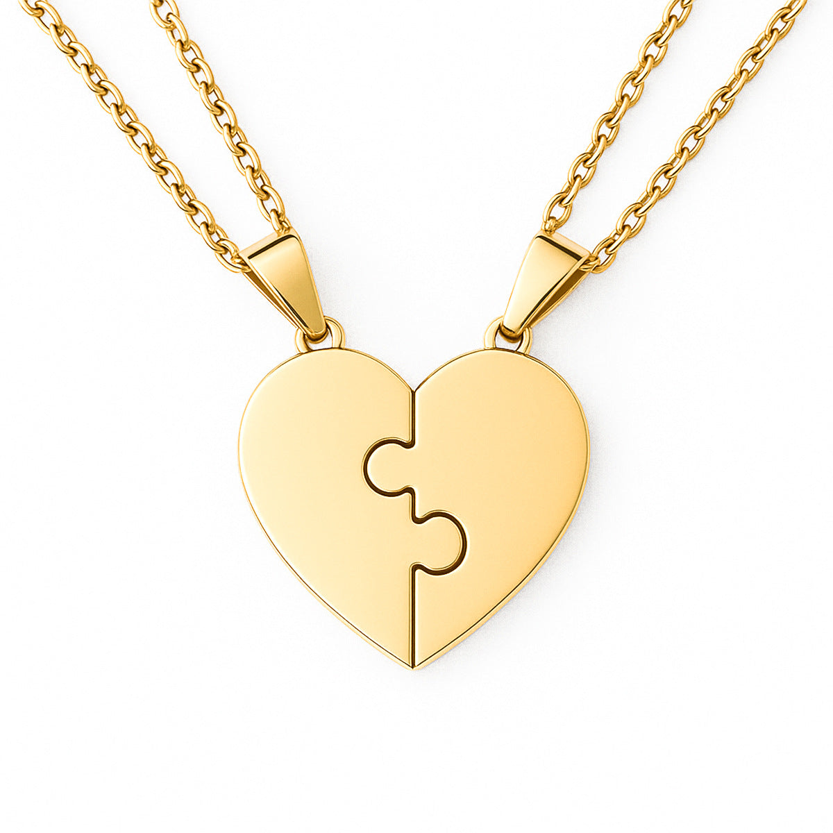 Gold heart-shaped puzzle piece pendant on a white background